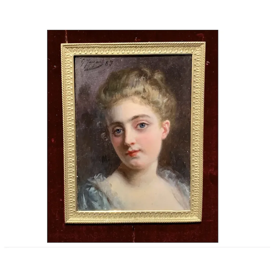 Portrait of a French 19th century lady in a gilt and ormolu hand made frame