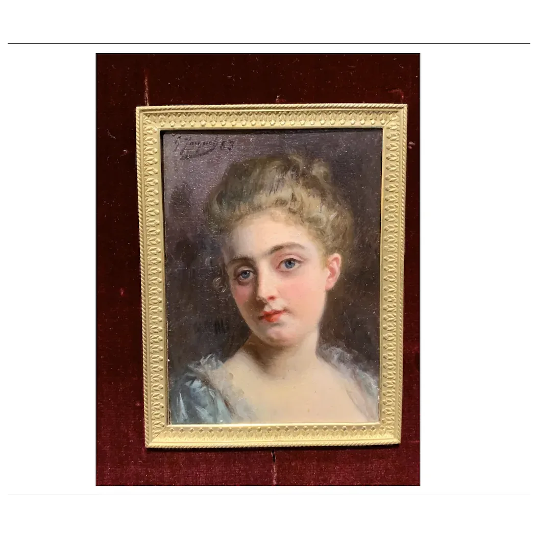 Portrait of a French 19th century lady in a gilt and ormolu hand made frame